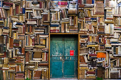 An assortment of books stacked on one another